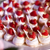 Meringue nests with raspberries and edible gold leaf